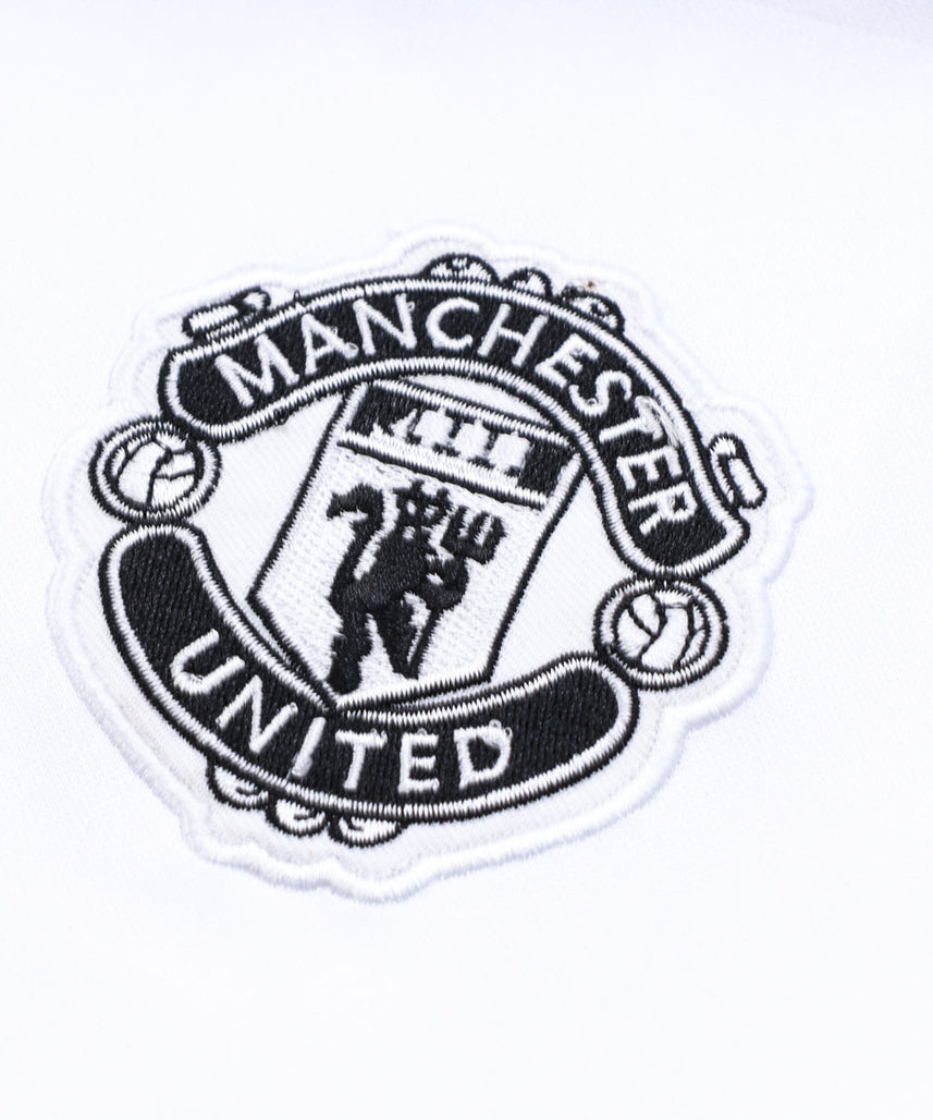Survêtement noir et blanc Manchester United
